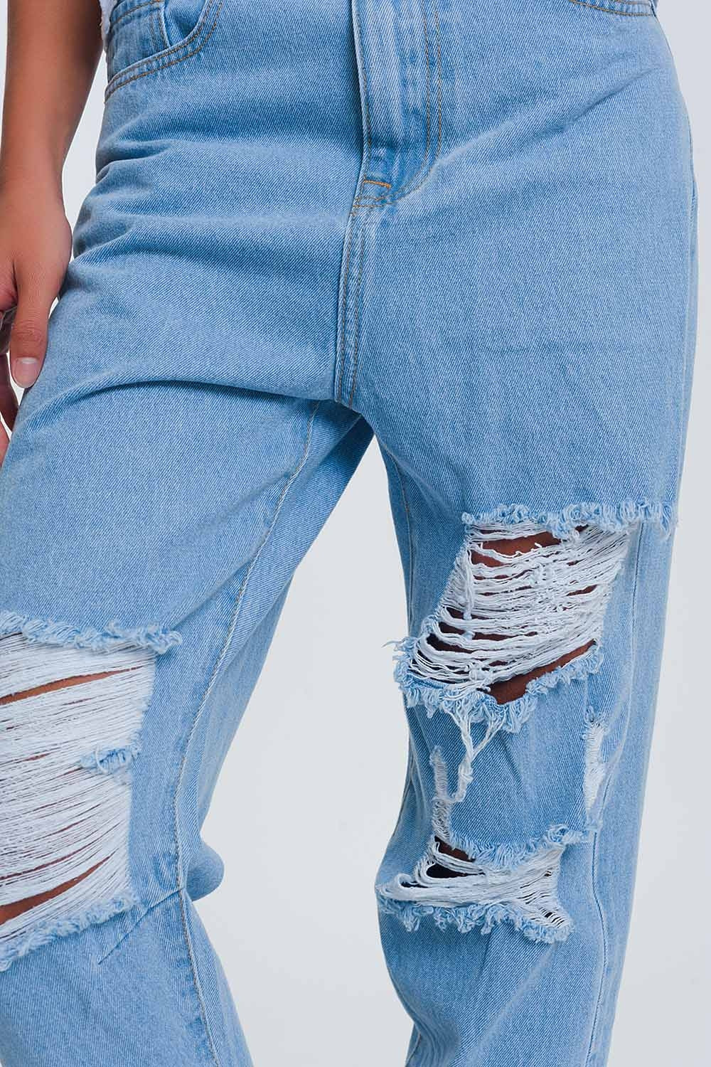 Mom jeans a vita alta a azzurro con strappi al ginocchio