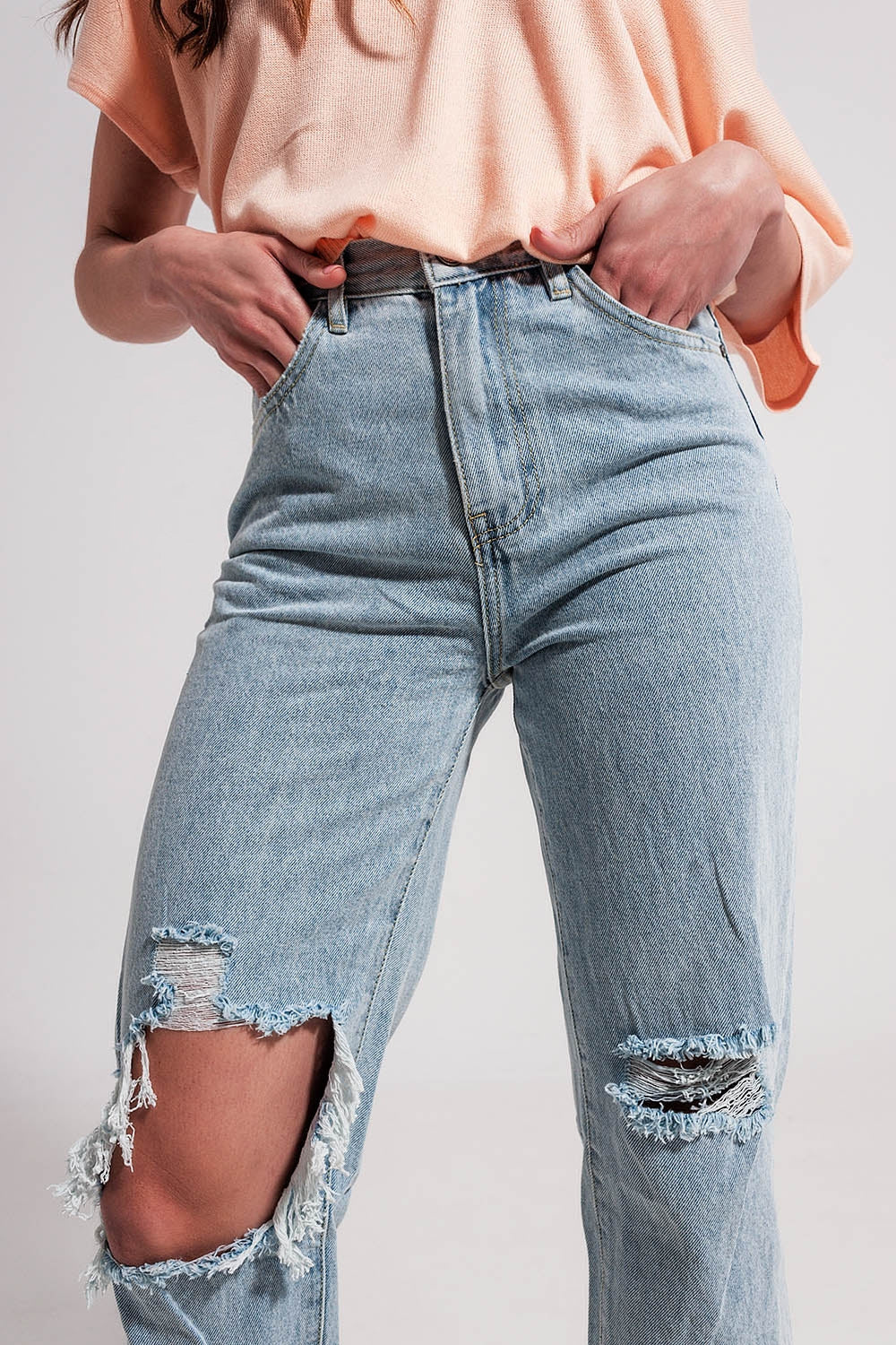 Mom jeans a vita alta lavaggio chiaro con rotture