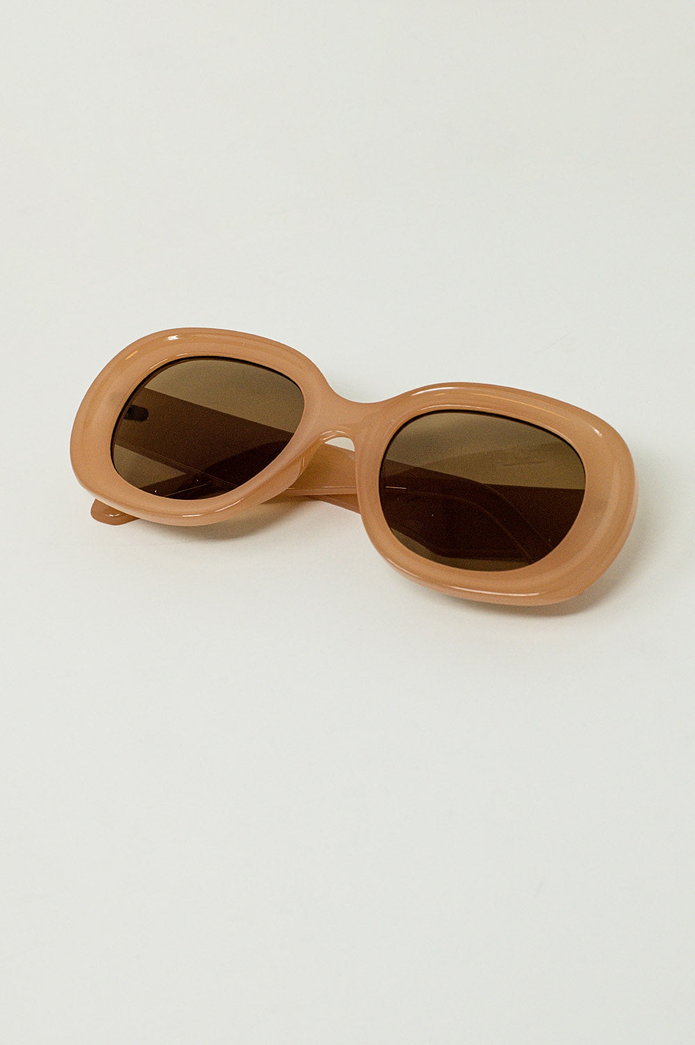 Occhiali da sole circolari oversize color beige