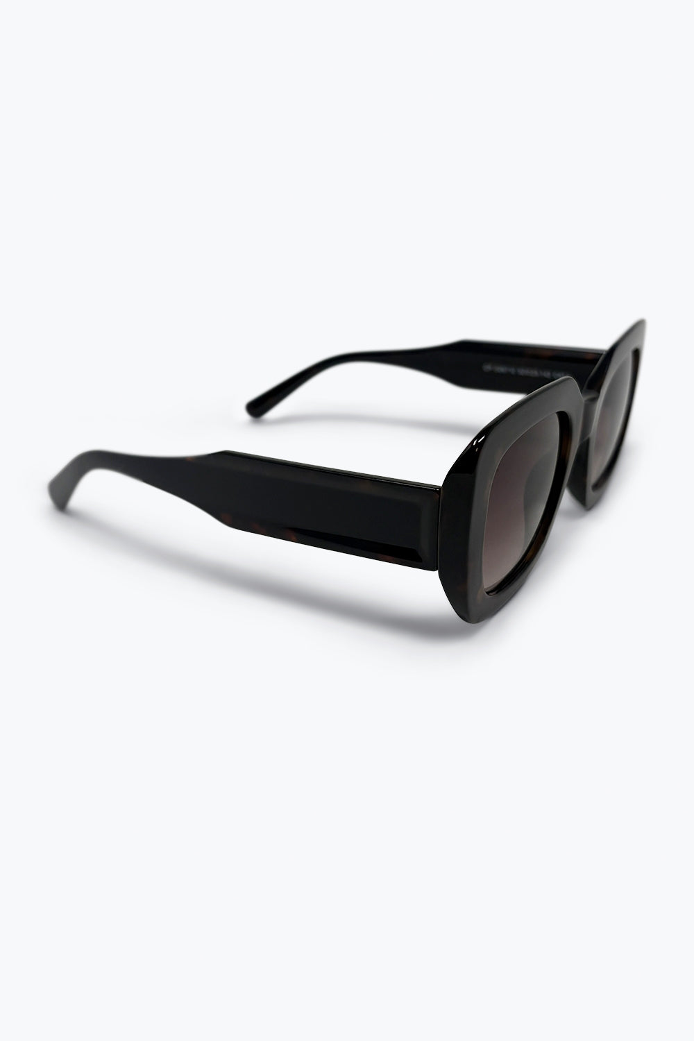 Occhiali da sole oversize con montatura quadrata in acetato nero tartarugato