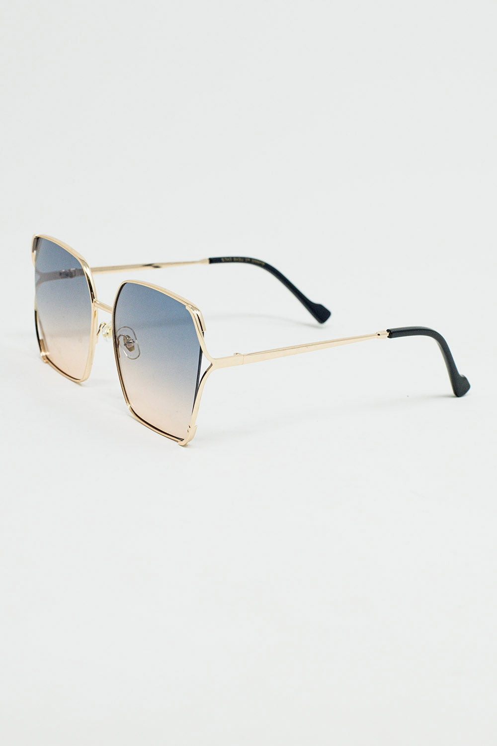Occhiali da sole quadrati oversize in metallo con lenti blu sfumate