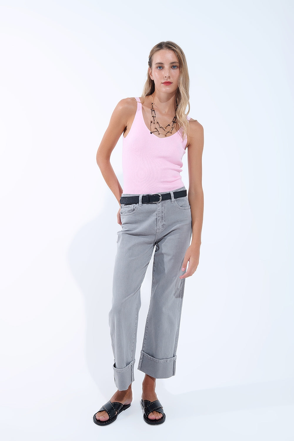 Pantaloni a gamba dritta con orlo ritagliato in grigio