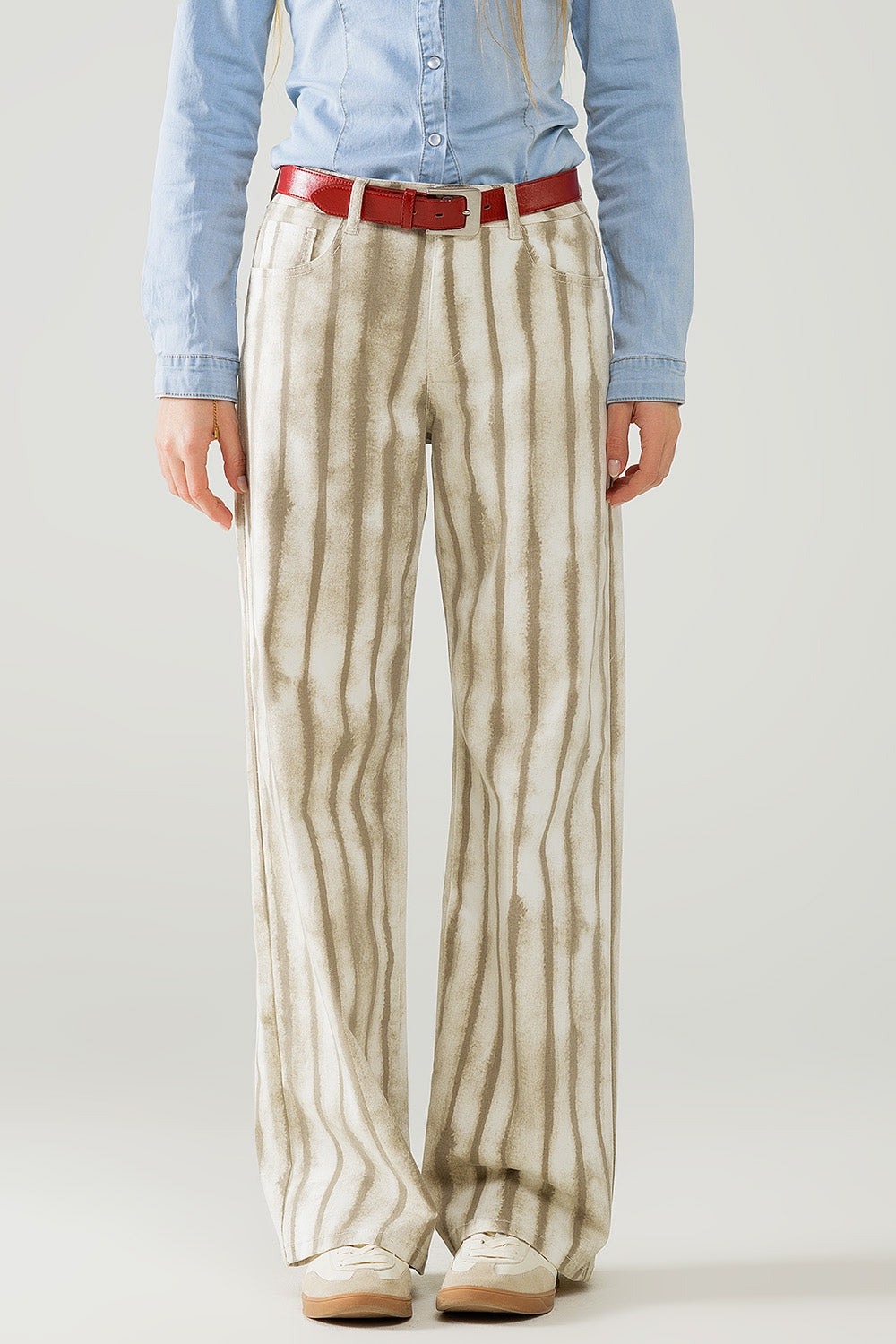 Pantaloni a gamba larga beige a righe elastiche
