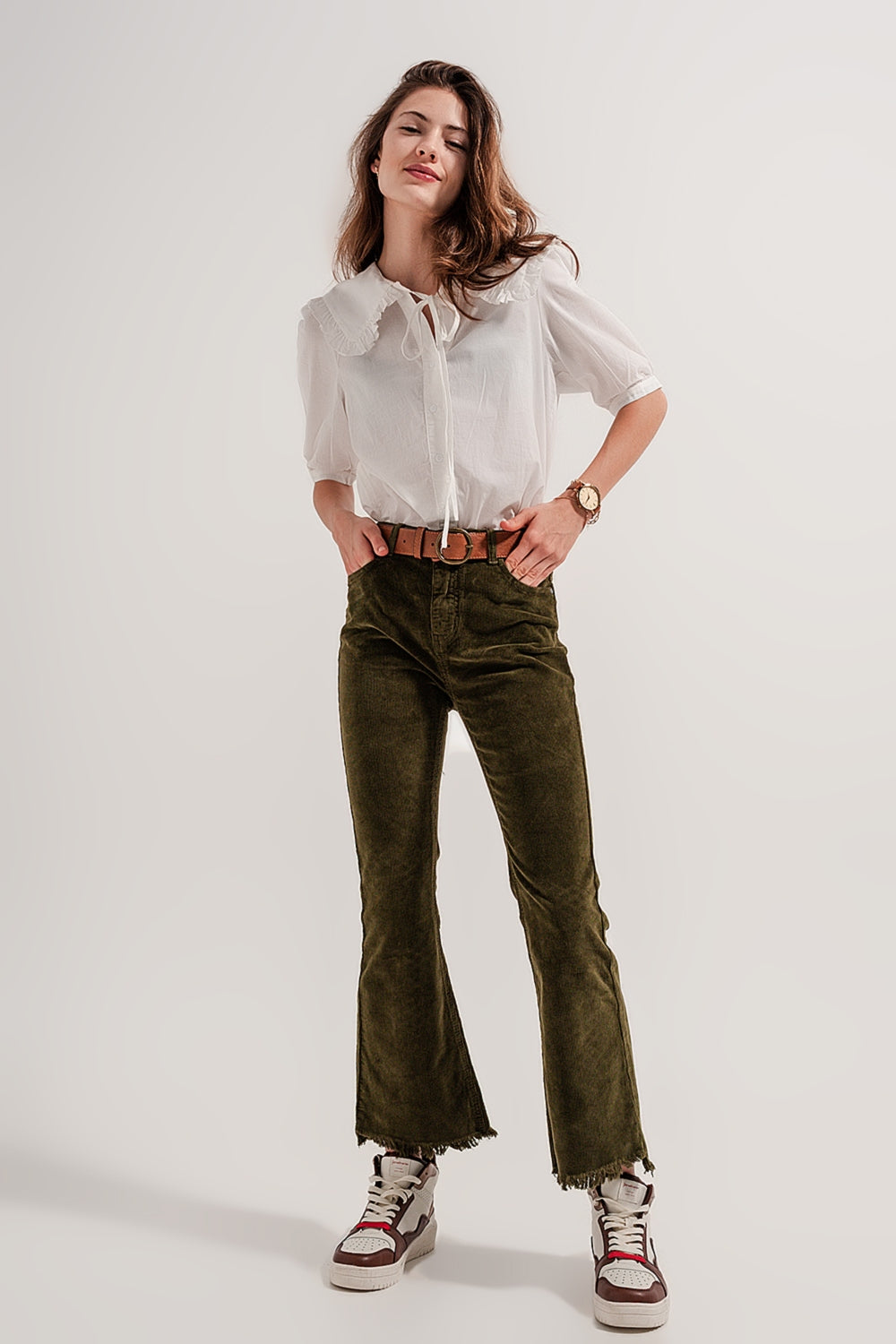 Pantaloni a zampa in velluto a coste color verde