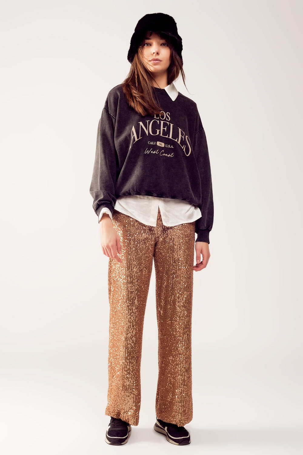 Pantaloni ampi in paillettes oro