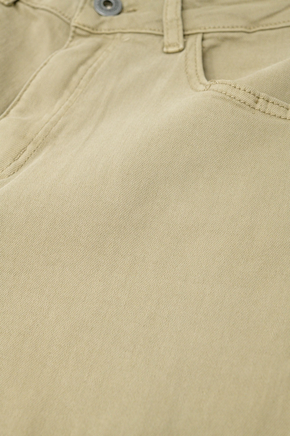 Pantaloni beige a gamba larga con stampa leopardata sul fondo