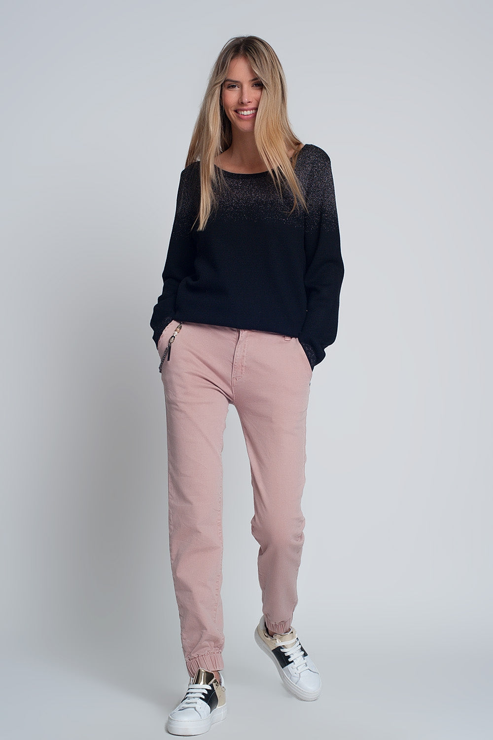 Pantaloni con elastico sul fondo e catena rosa