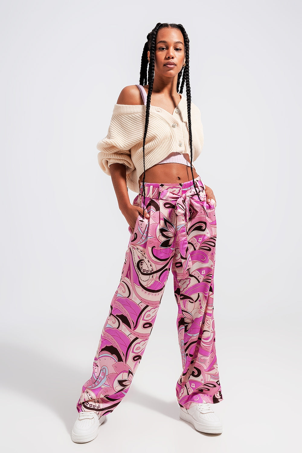 Pantaloni con fondo ampio e cintura in color rosa
