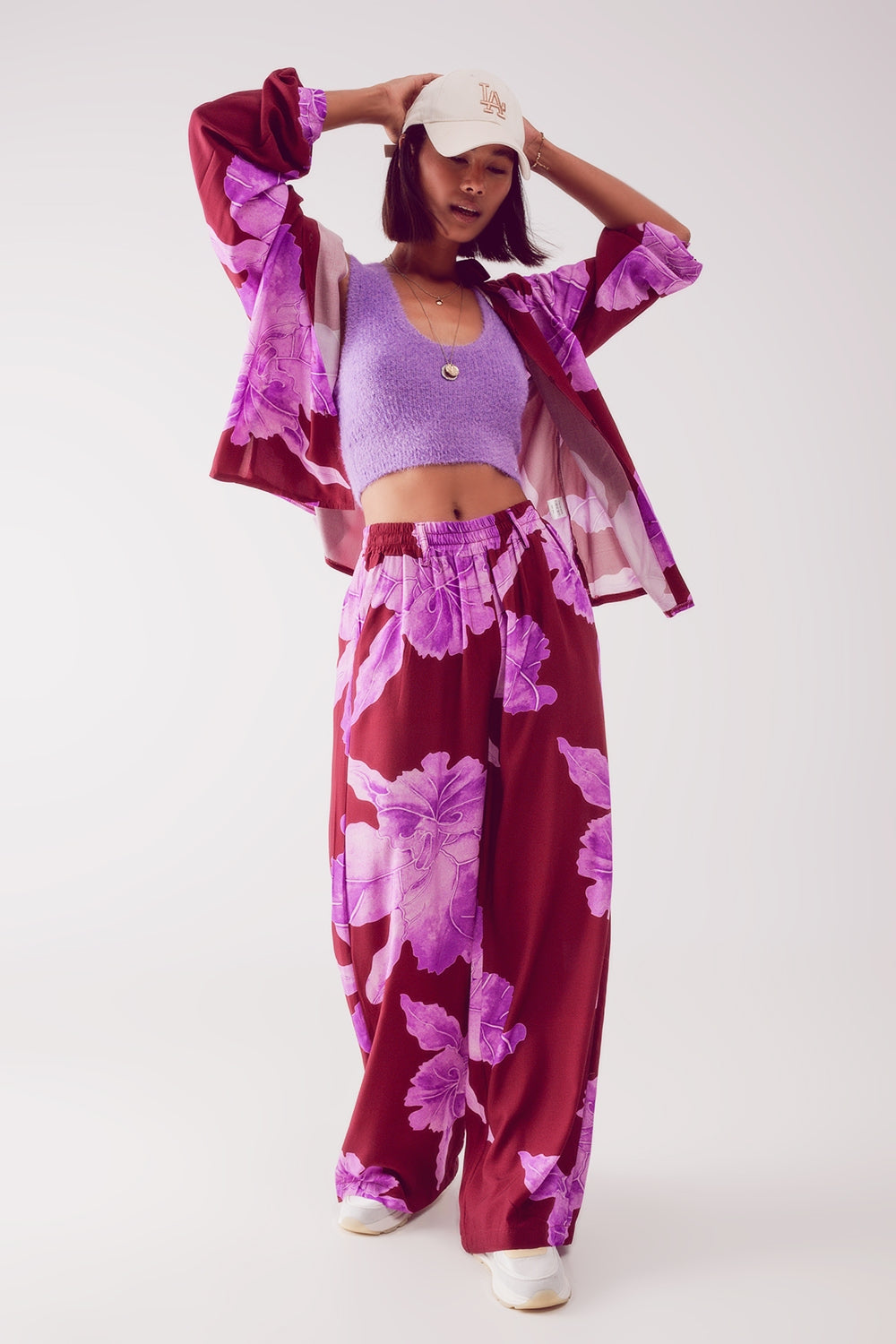 Pantaloni dritti fucsia con stampa astratta a fiori
