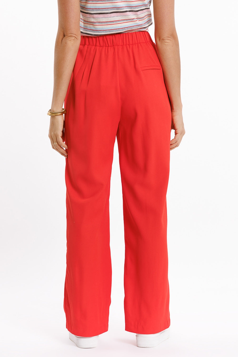 Pantaloni in corallo con tasche frontali e coulisse di chiusura