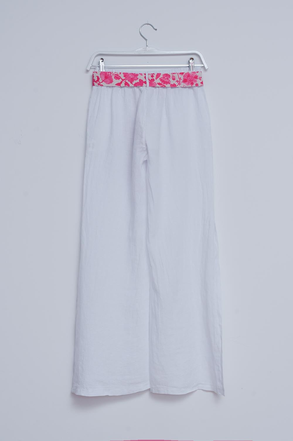 Pantaloni in lino ampi color bianco con spacchi laterali
