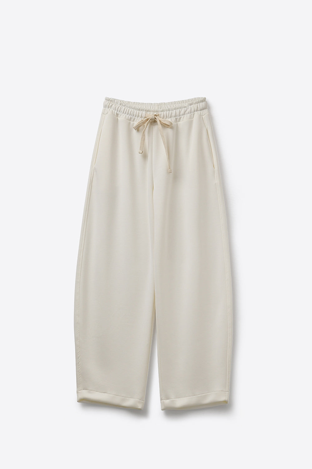 Pantaloni jogger in maglia morbidissima color crema con coulisse in vita