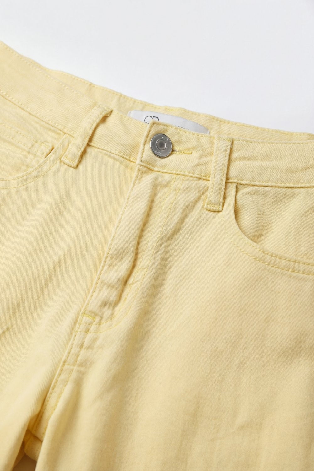 Pantaloni larghi in cotone giallo chiaro con cucitura laterale