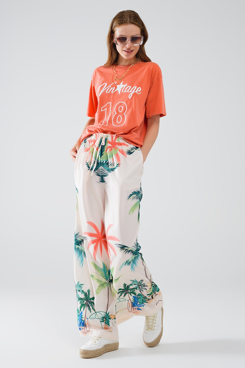 Pantaloni panna a gamba dritta con stampa spiaggia e vita elastica