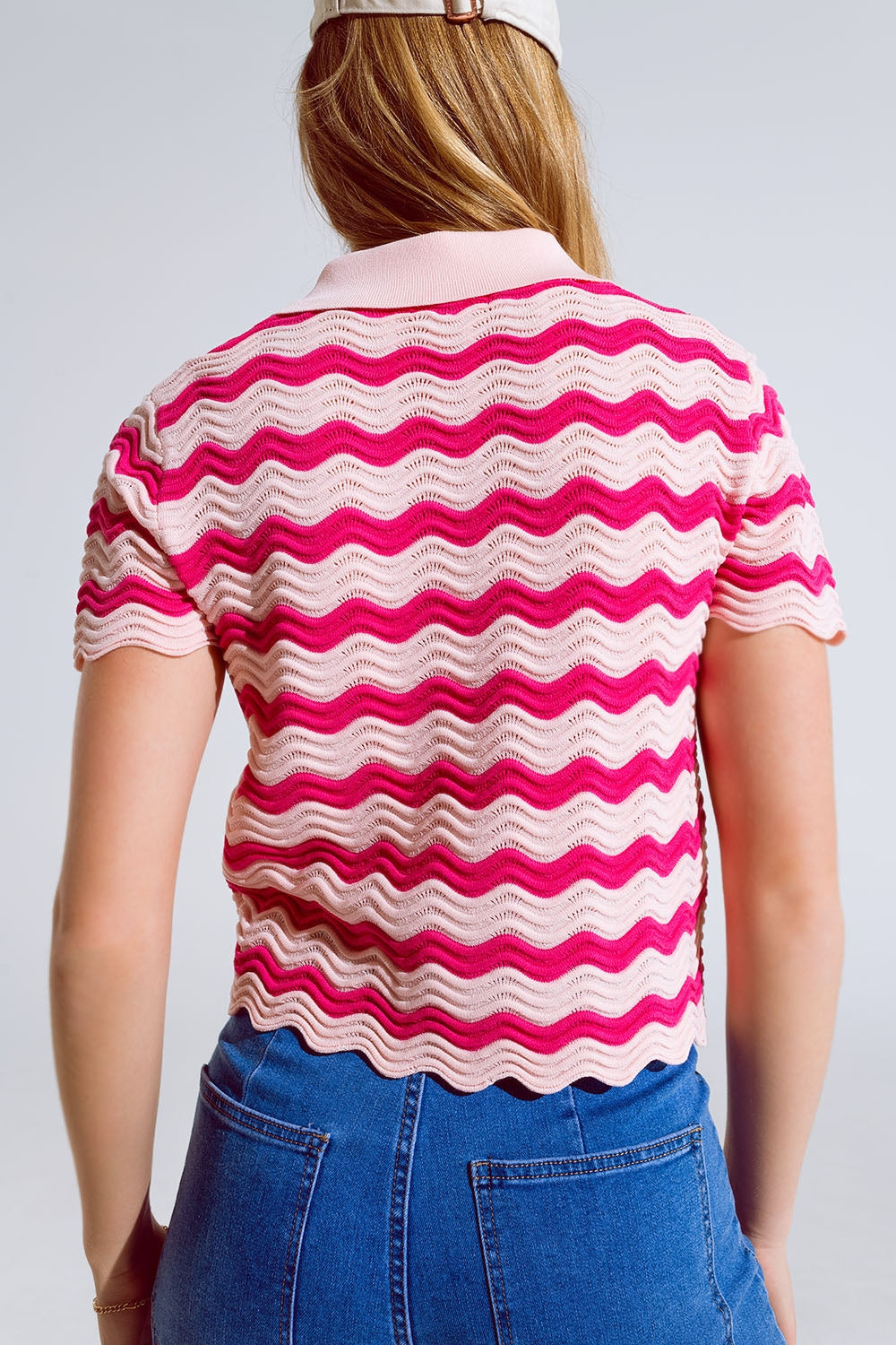Polo rosa con righe ondulate fucsia
