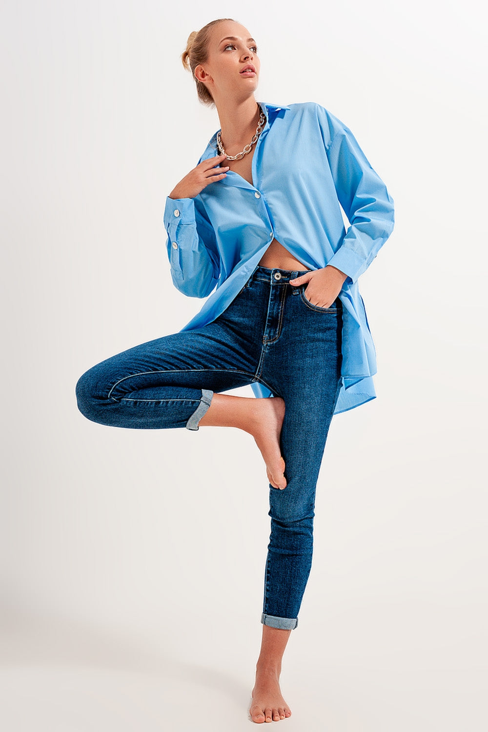 skinny jeans a vita alta lavaggio scuro e risvolti
