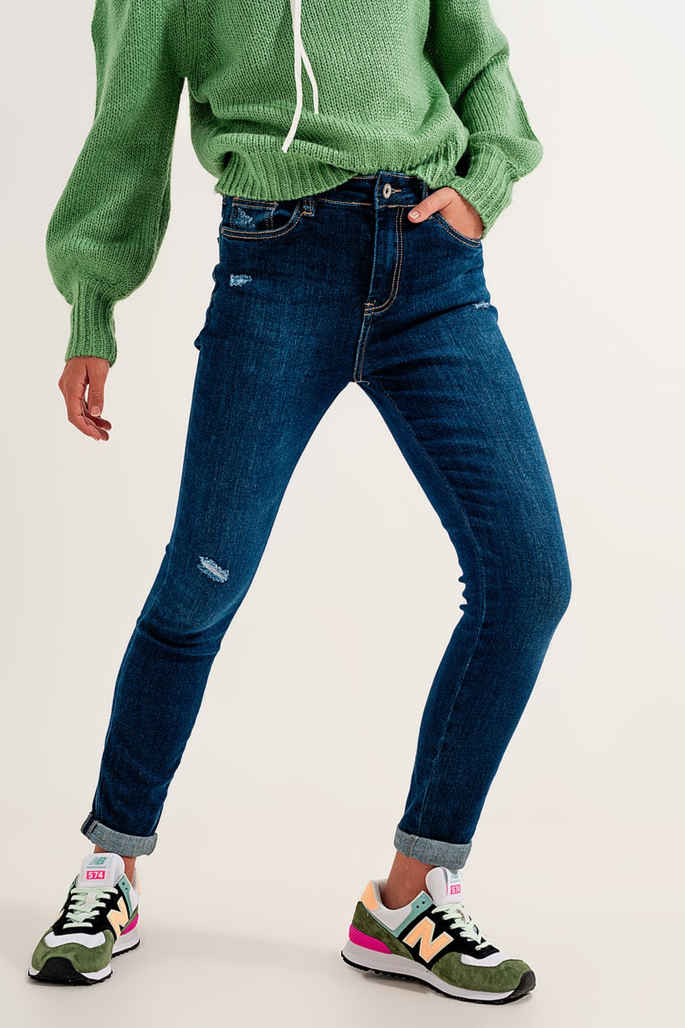Skinny jeans tono blu medio con risvolti elasticizzato