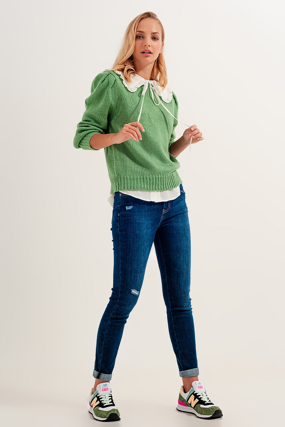 Skinny jeans tono blu medio con risvolti elasticizzato