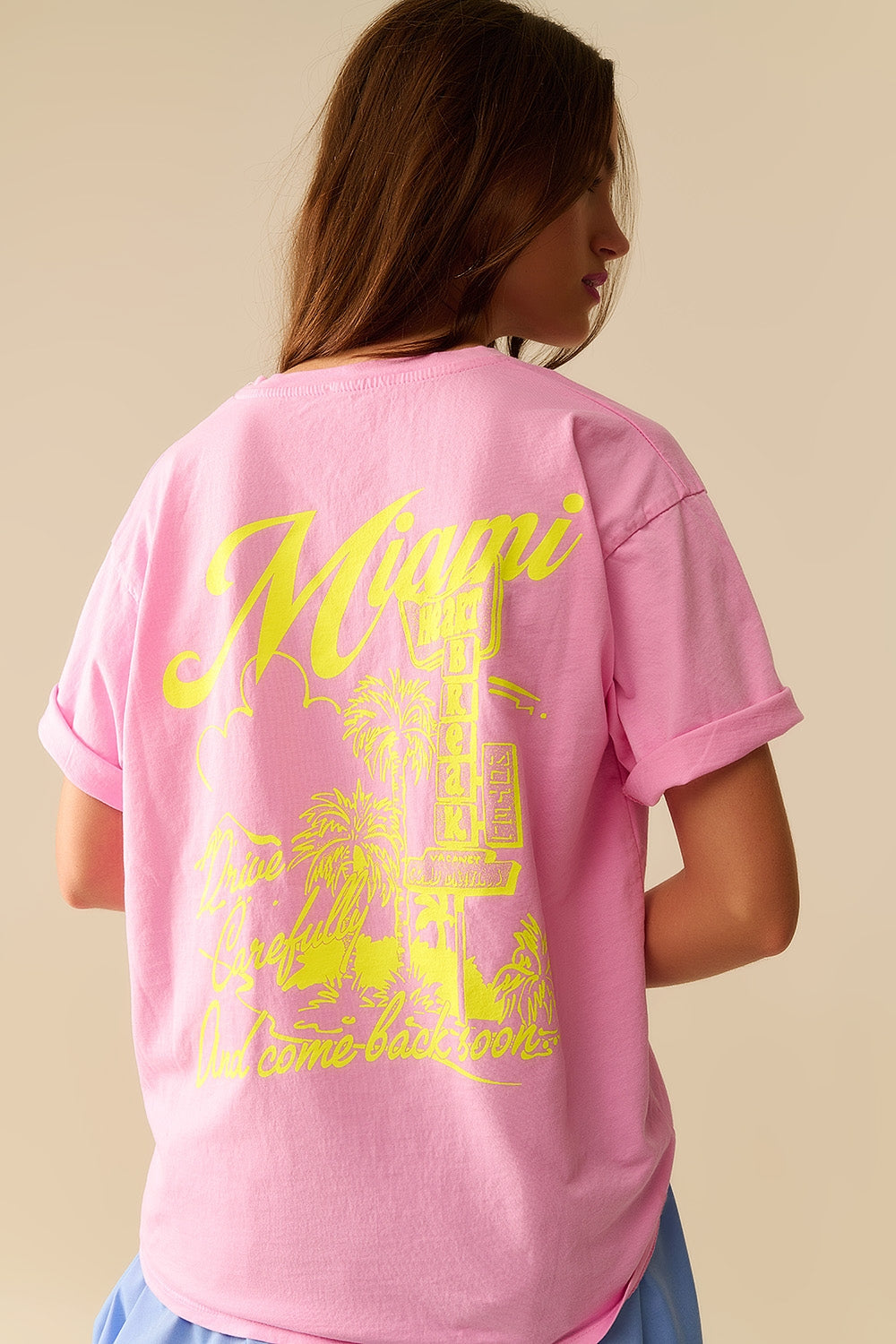 T-shirt rosa con stampa del logo Miami in giallo