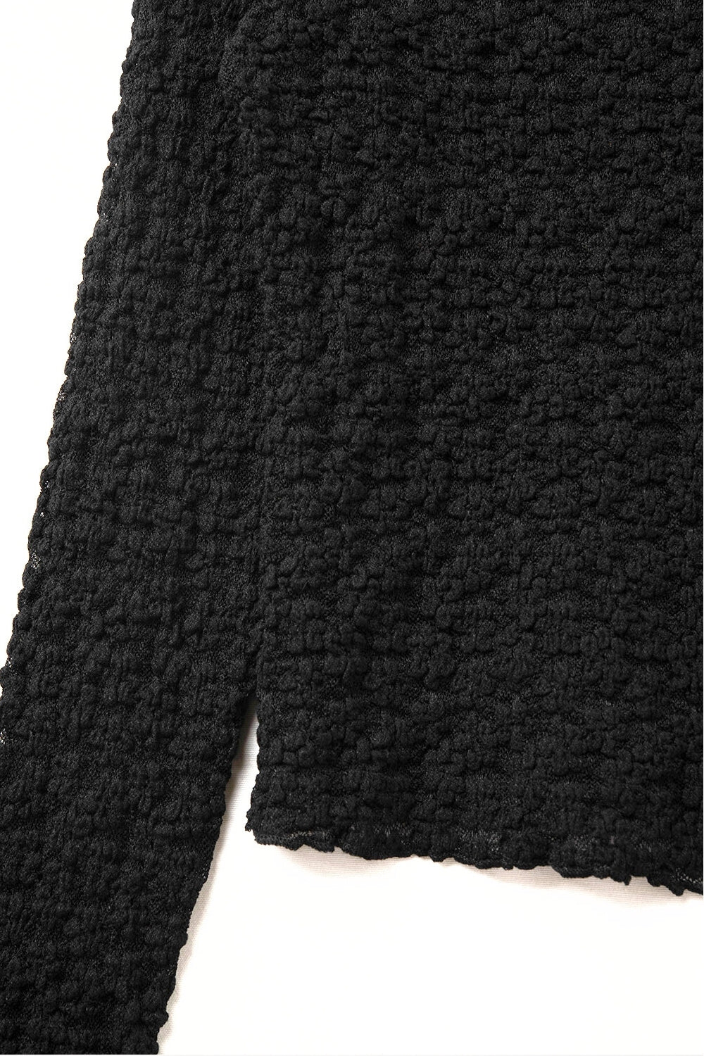 top a maniche lunghe nero floreale trasparente