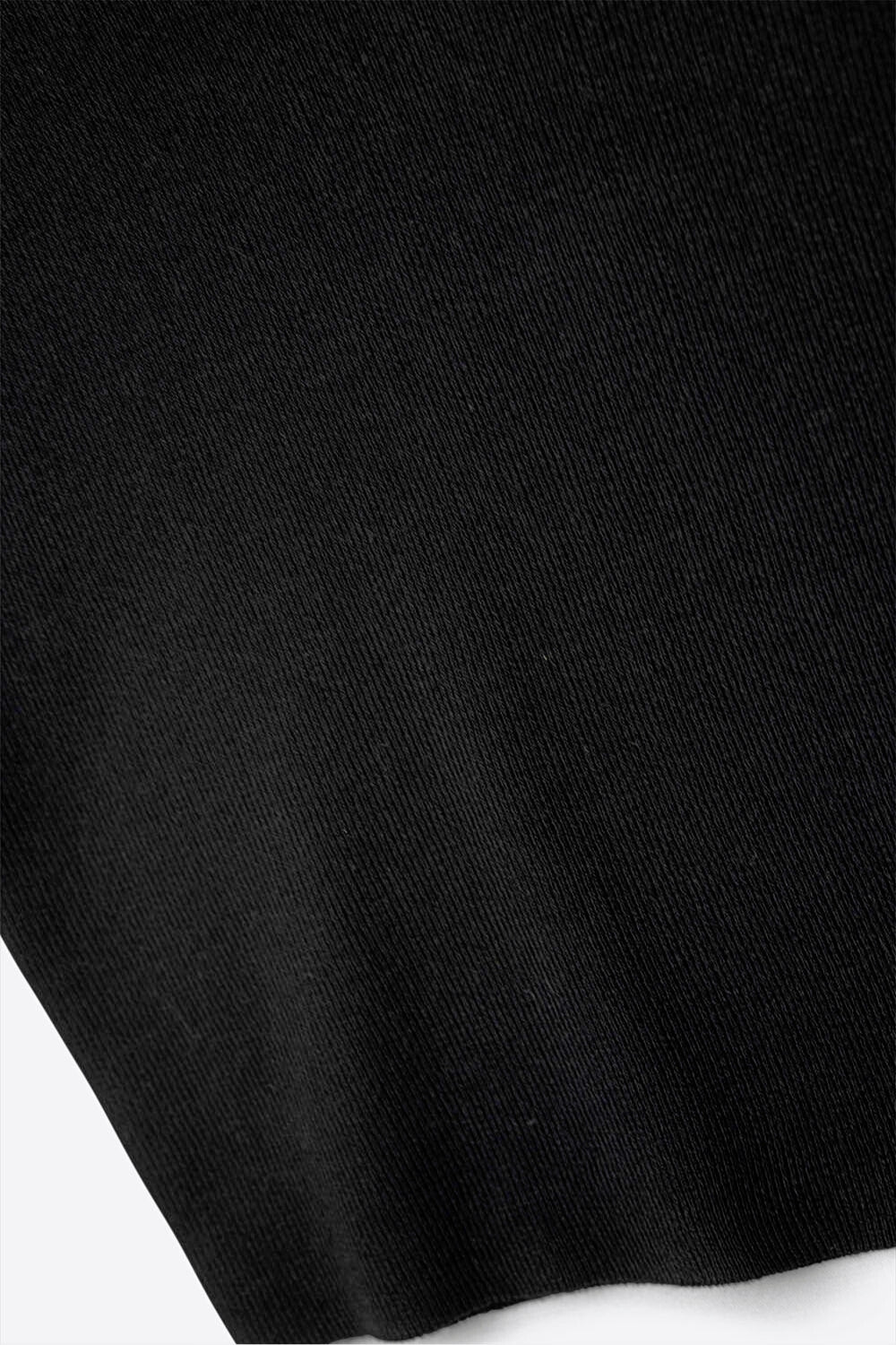 Top nero in maglia a coste con scollo a V e spaghetti