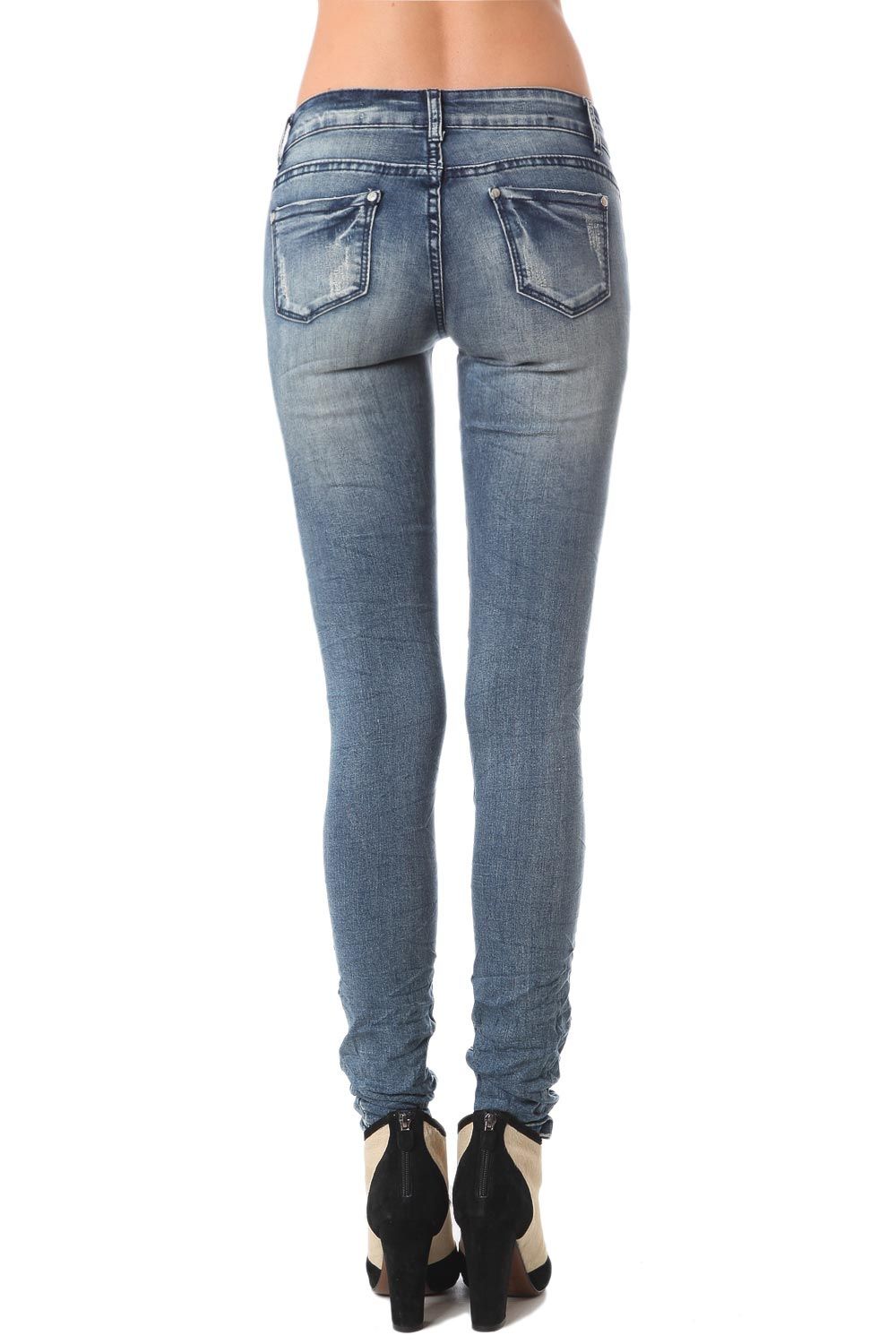 Jeans cigarrette con effetto consumato