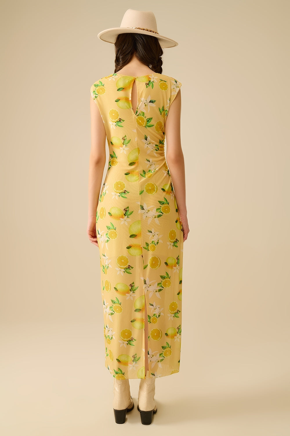 Abito in tulle con balza laterale con stampa giallo limone