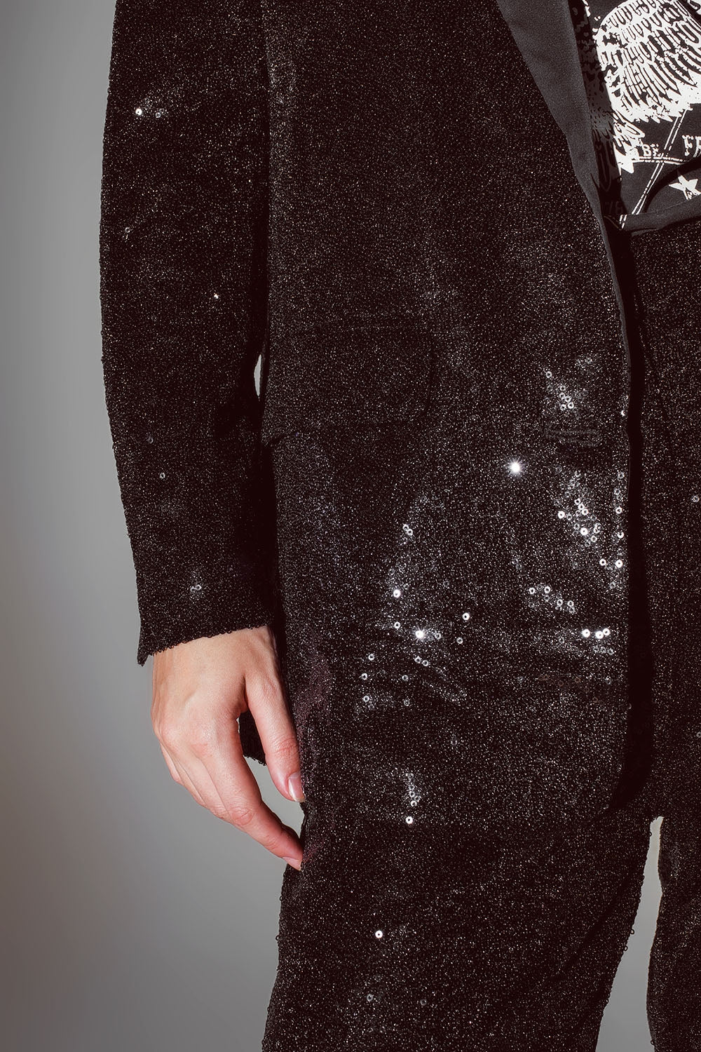 Blazer nero in paillettes con revers da smoking in raso