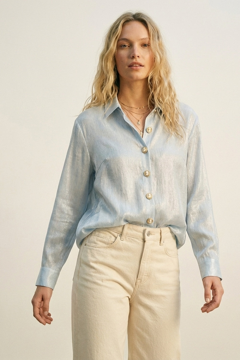 blusa a maglia blu brillante con bottoni retrò