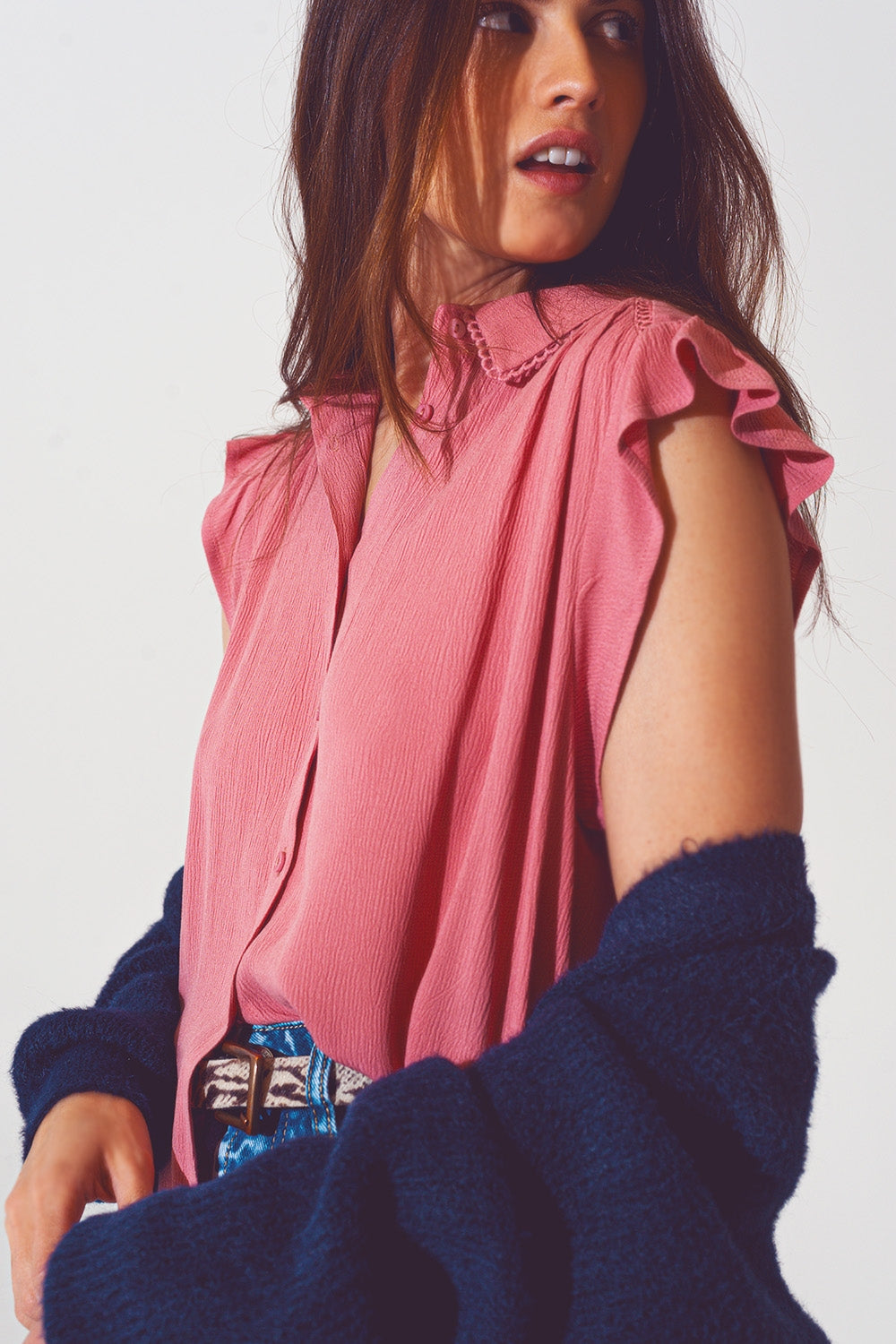 Blusa con maniche corte a volant in rosa