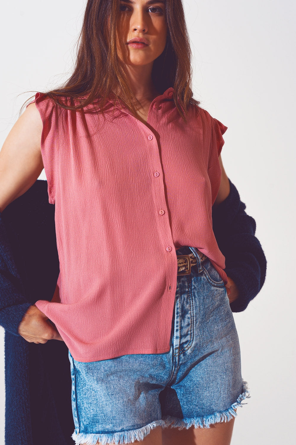 Blusa con maniche corte a volant in rosa