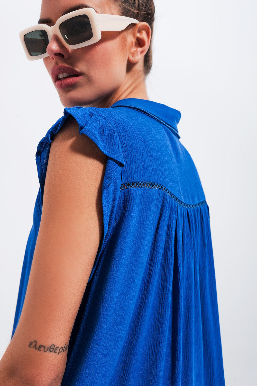 Blusa maniche con volant blu