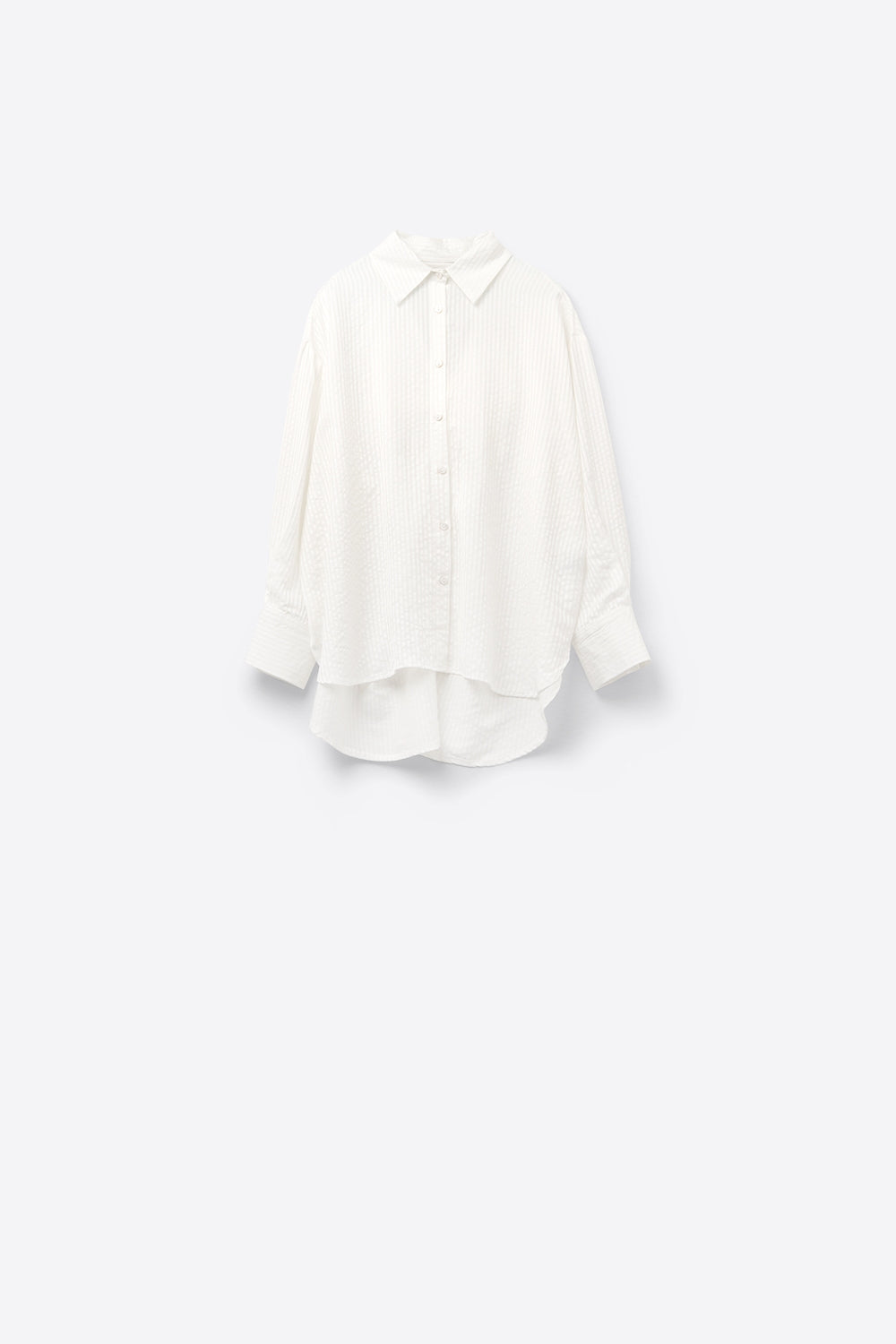 camicia bianca oversize con fiocco sul retro