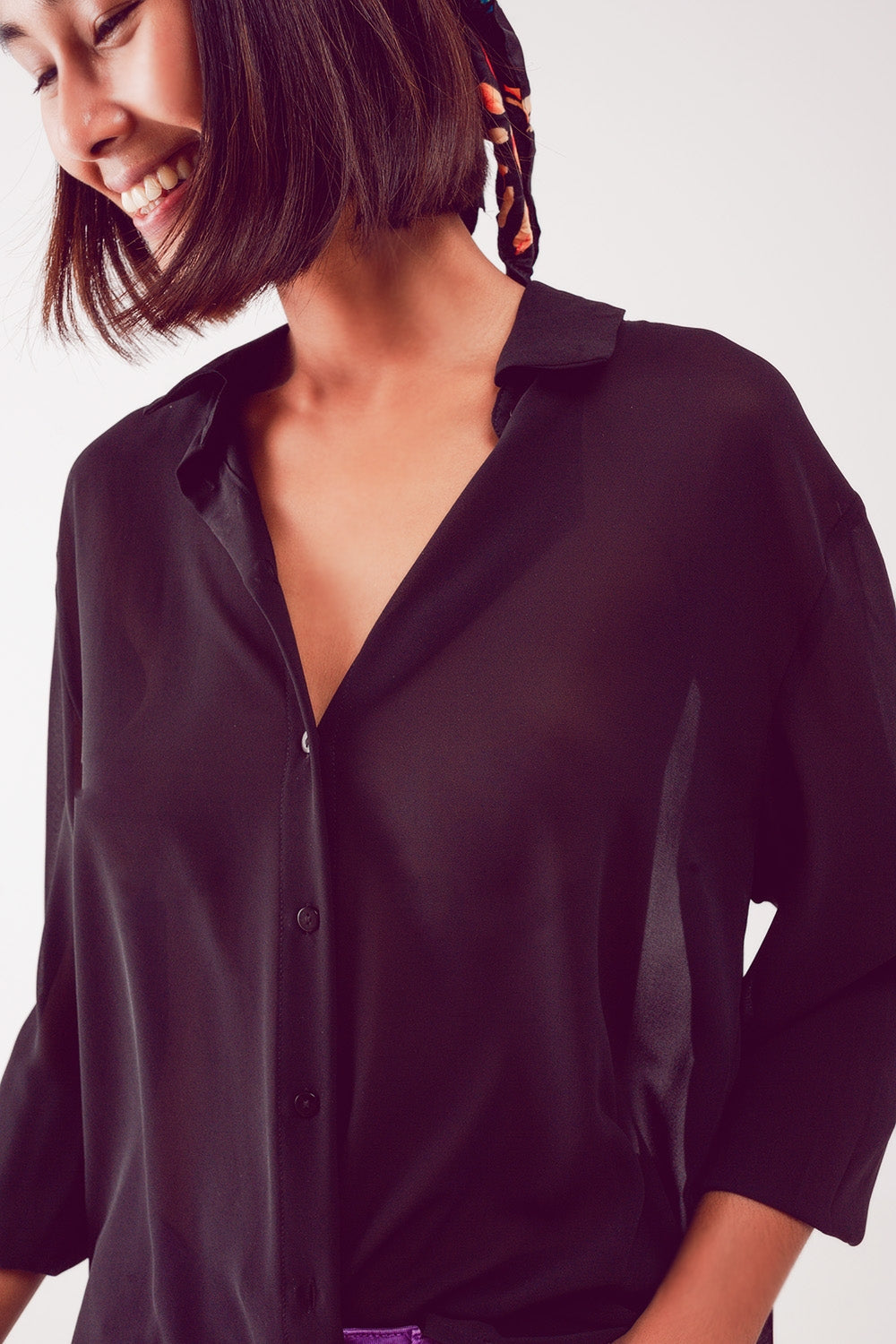 Camicia nera in chiffon trasparente