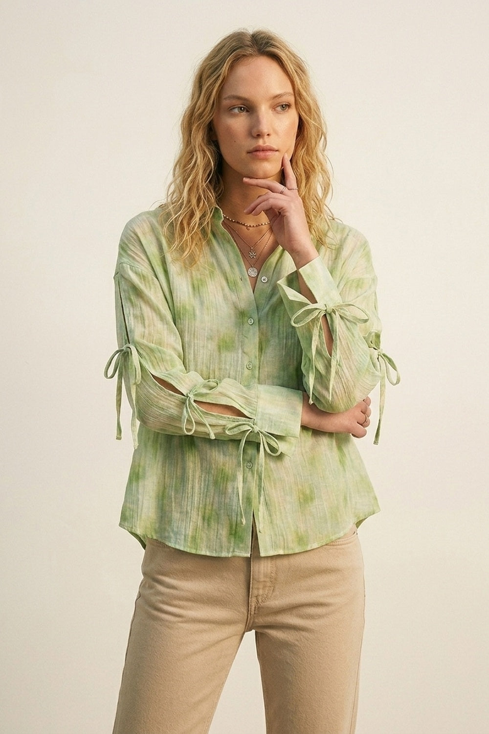 Camicia oversize a bottoni verde chiaro con maniche a fiocco