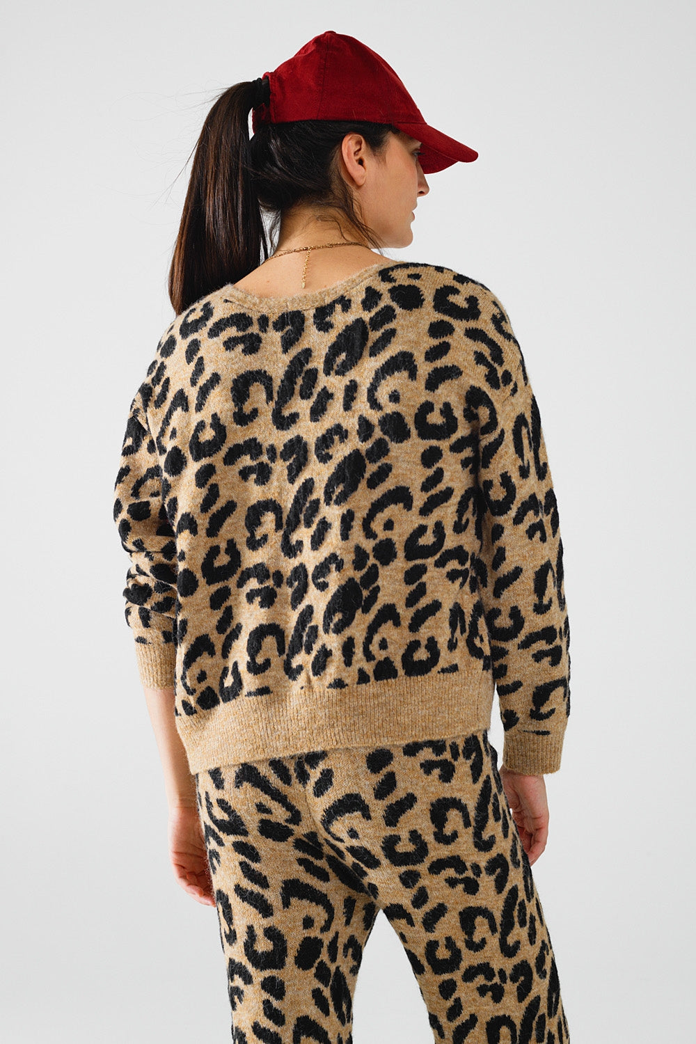 Cardigan a maniche lunghe con stampa leopardo e dettagli con fiocchi