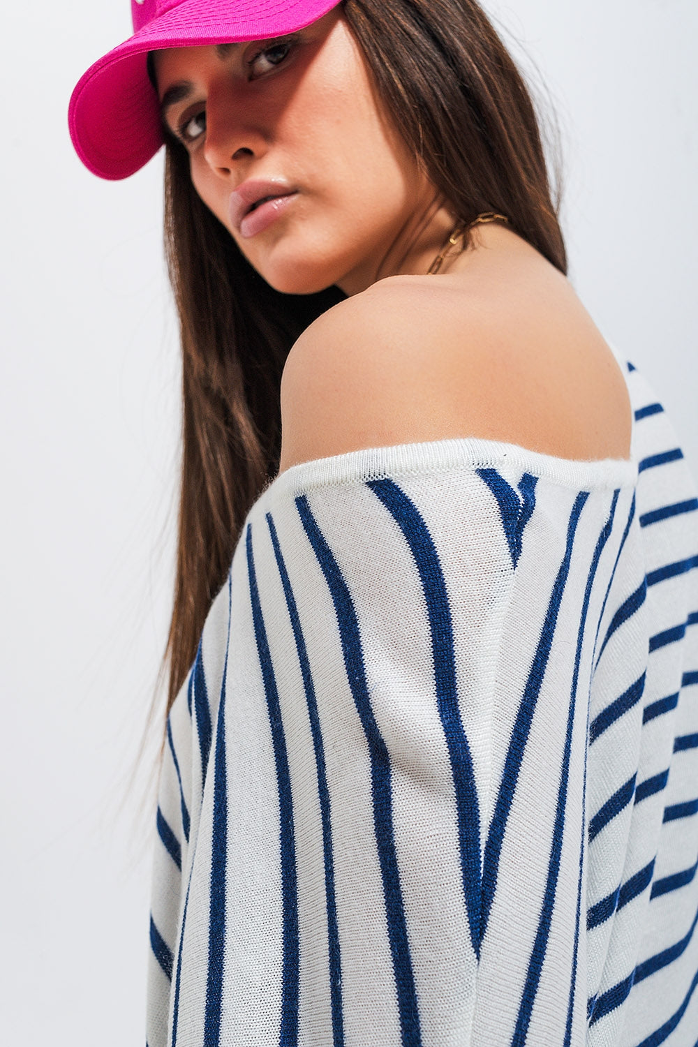Cardigan a righe color crema con bottoni