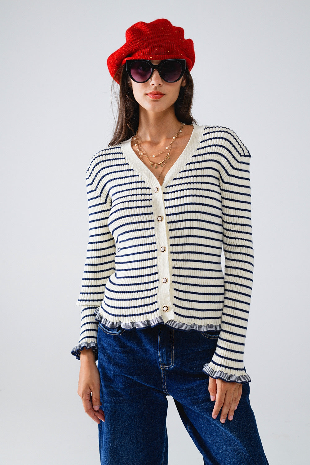Cardigan a righe in crema con volant