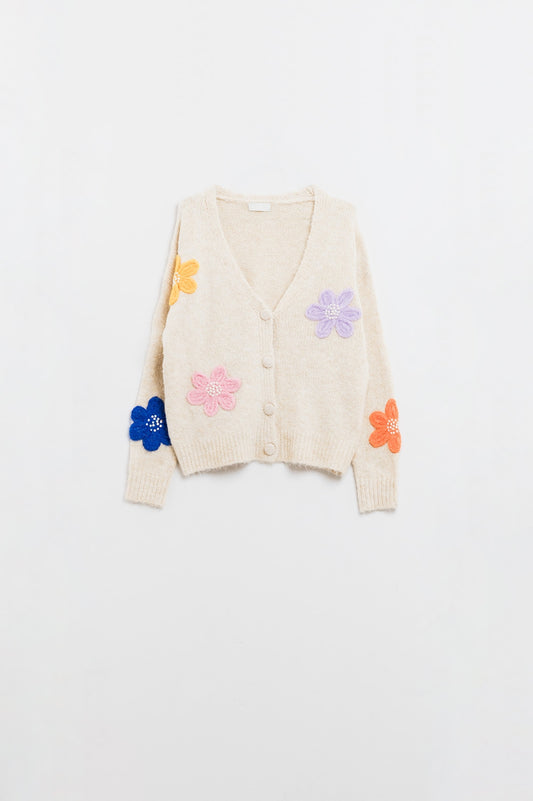 Cardigan color crema con fiori in rilievo