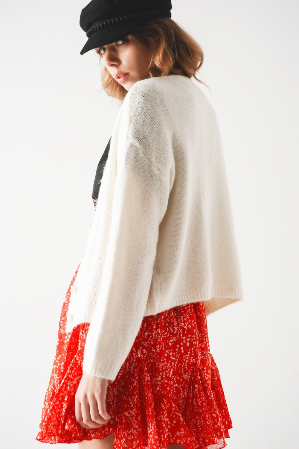 Cardigan con bottoni in crema