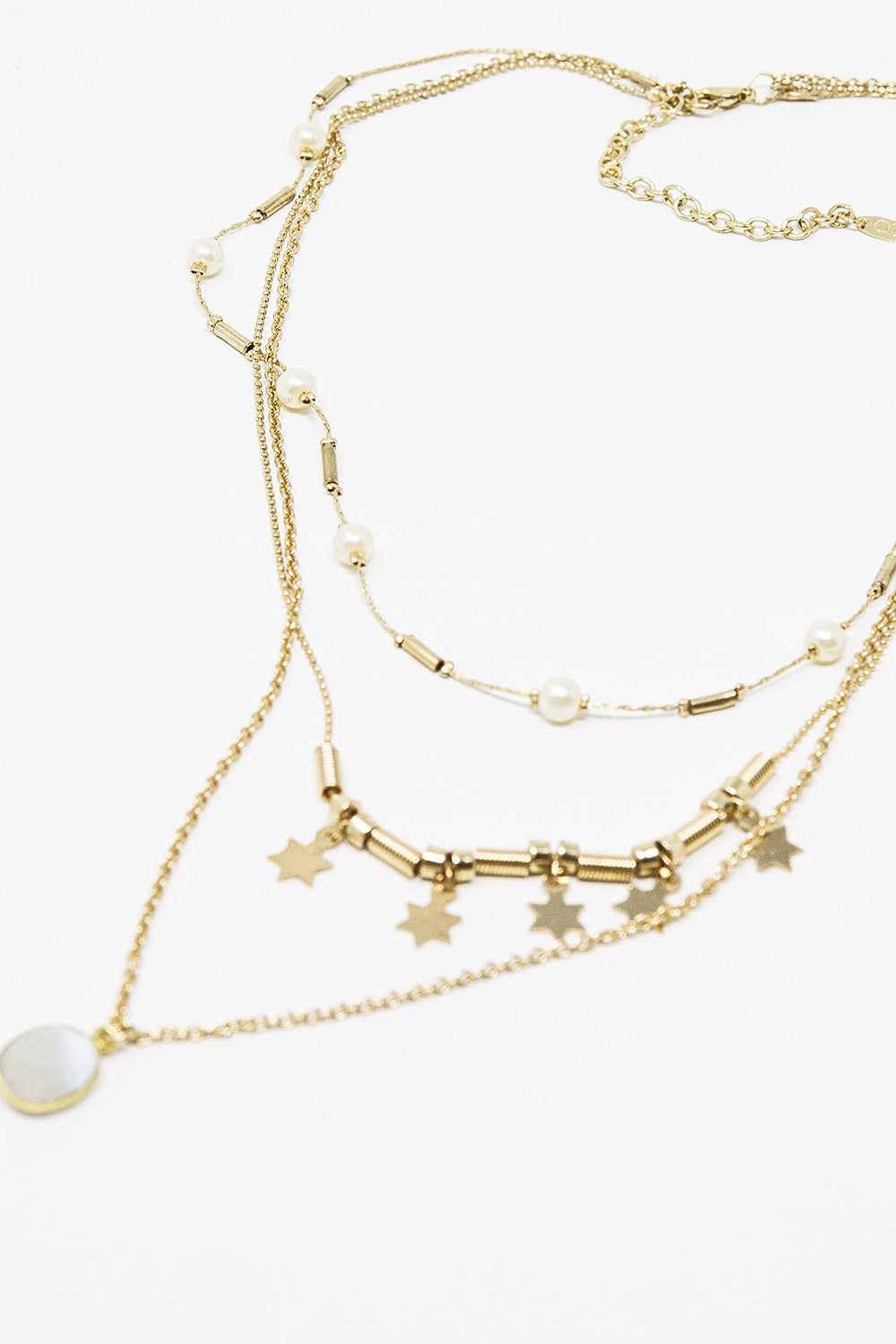Collana 3 in 1 con dettaglio di stelle e perle