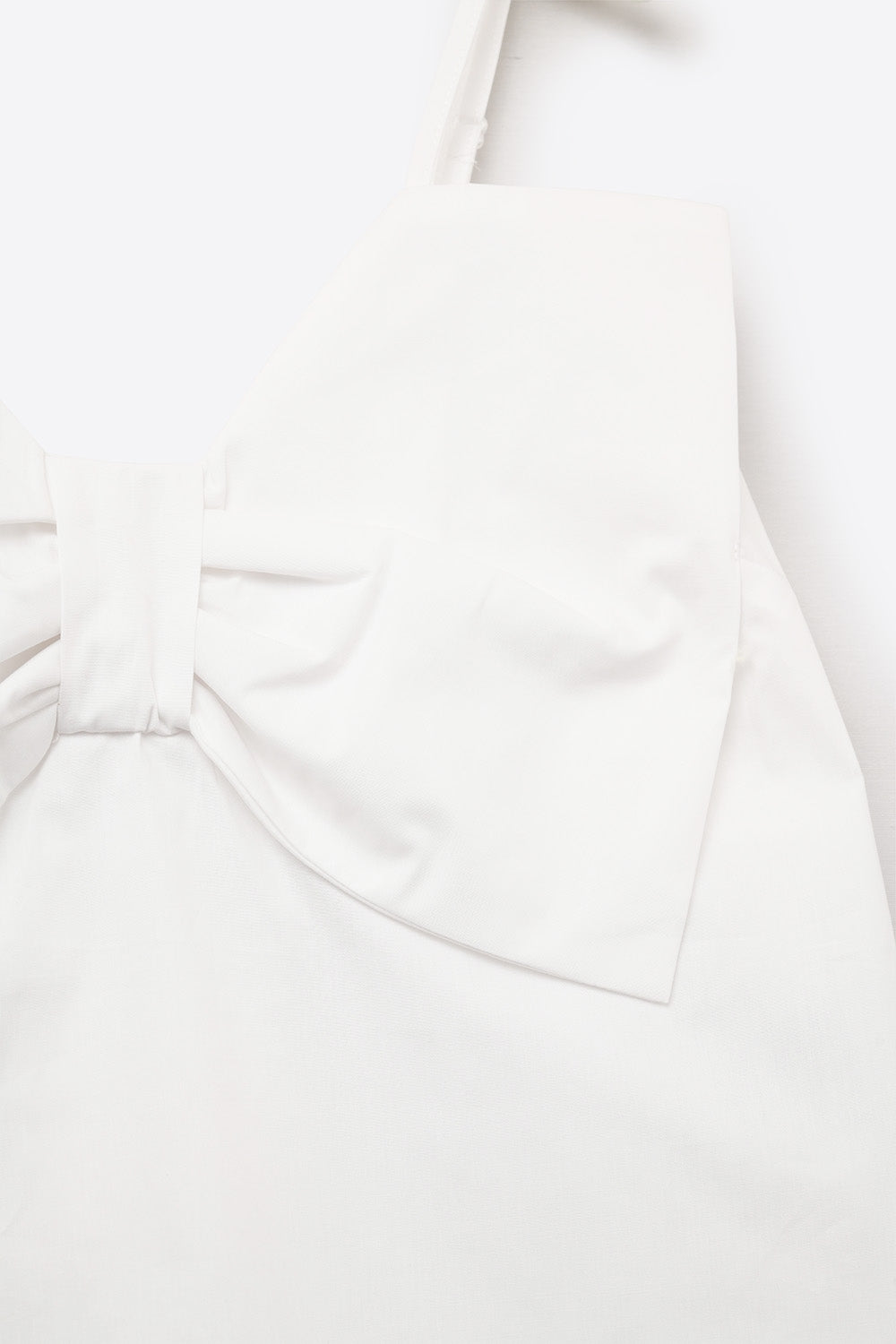 Crop top in popeline bianco con fiocco