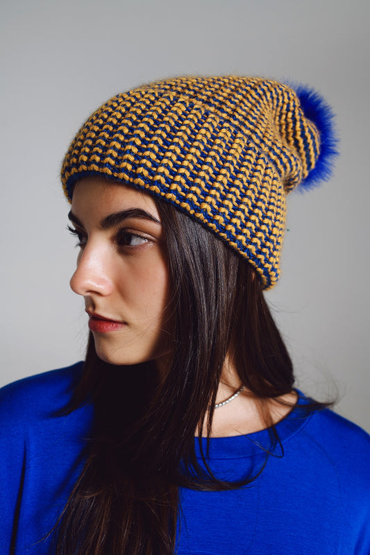 Q2 Cuffia a maglia con pompon in blu e giallo
