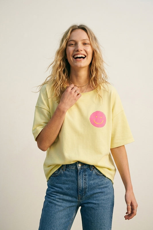 Q2 Felpa gialla in cotone taglio ampio con patch smile