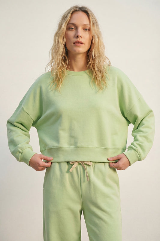 Q2 Felpa girocollo con spalle scese di colore verde