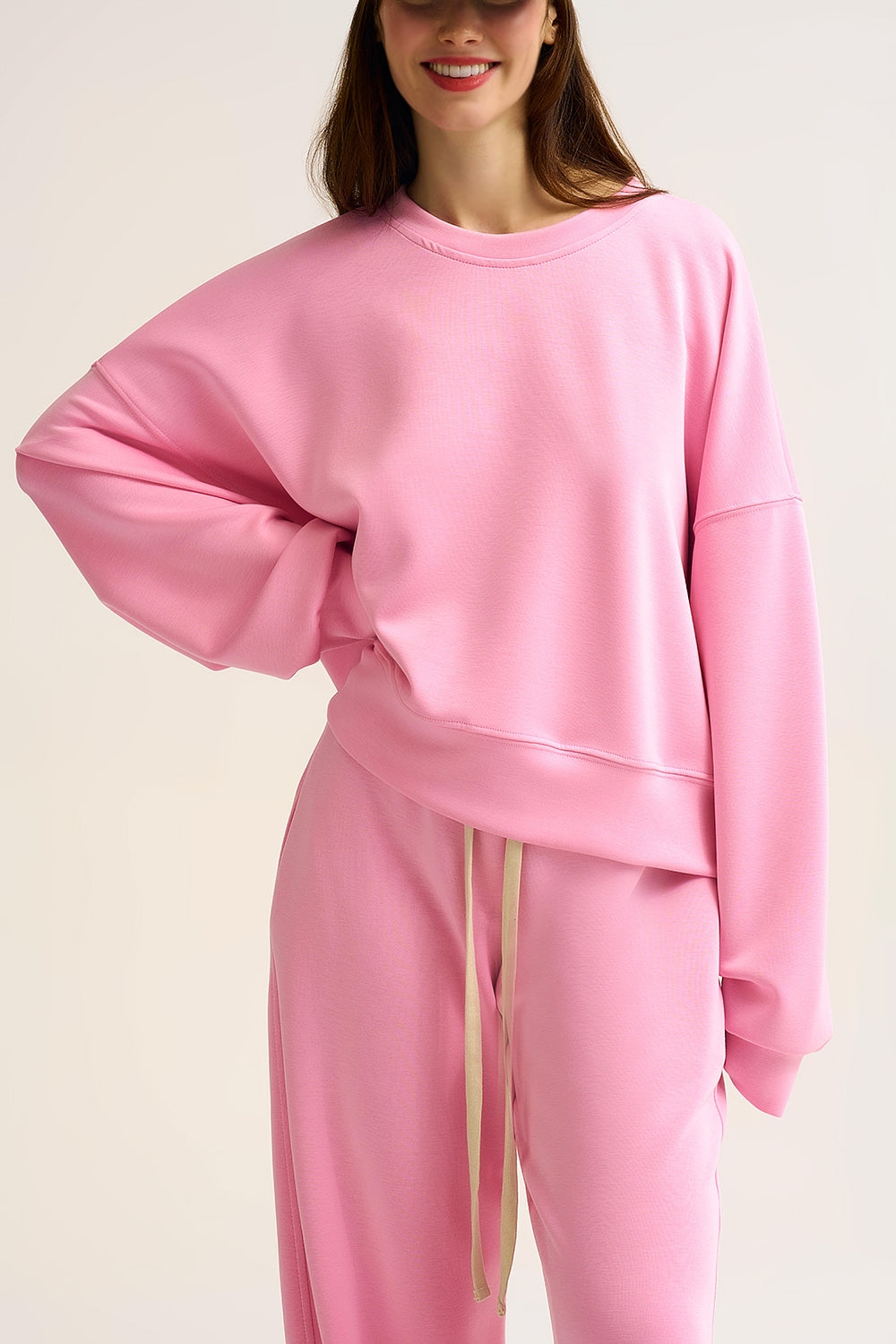 Felpa girocollo con spalle scese in rosa