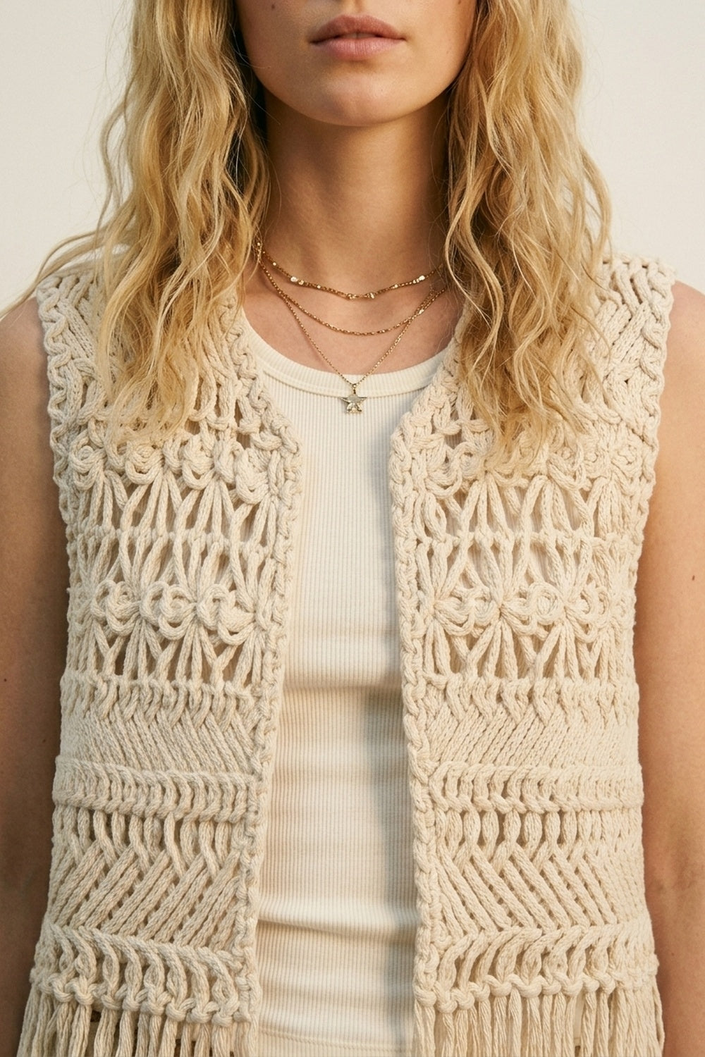 Gilet aperto con frange