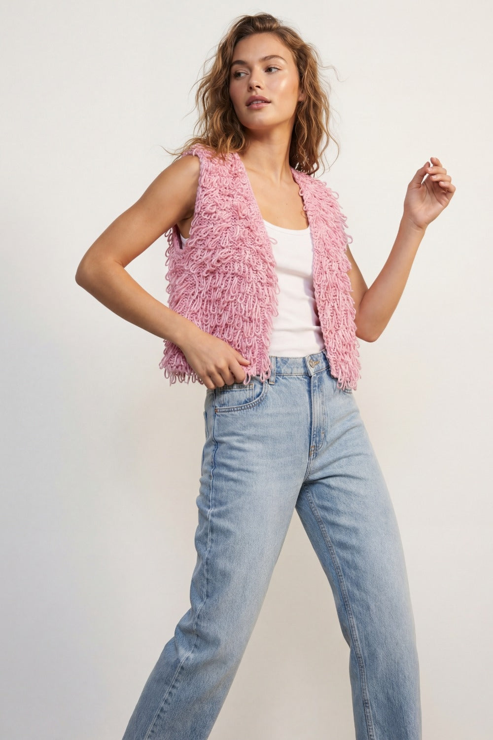 Gilet in maglia con effetto frangia testurizzato in rosa
