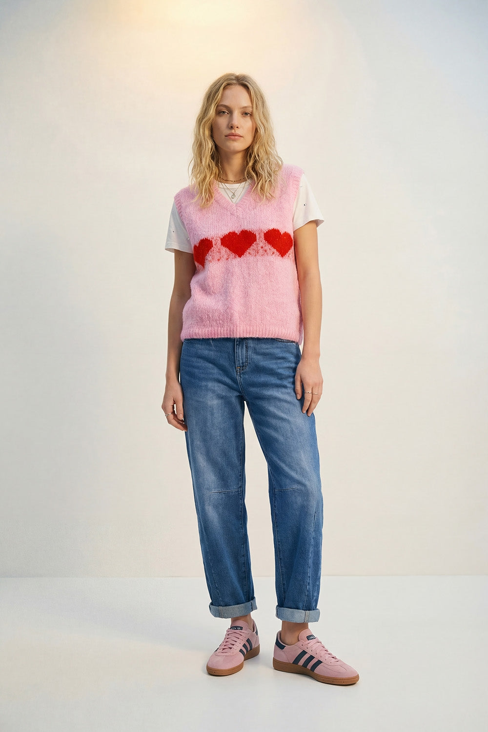 Gilet in maglia rosa vaporosa dalla vestibilitˆ rilassata con motivo a cuore