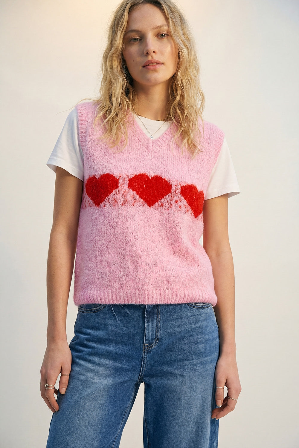 Gilet in maglia rosa vaporosa dalla vestibilitˆ rilassata con motivo a cuore